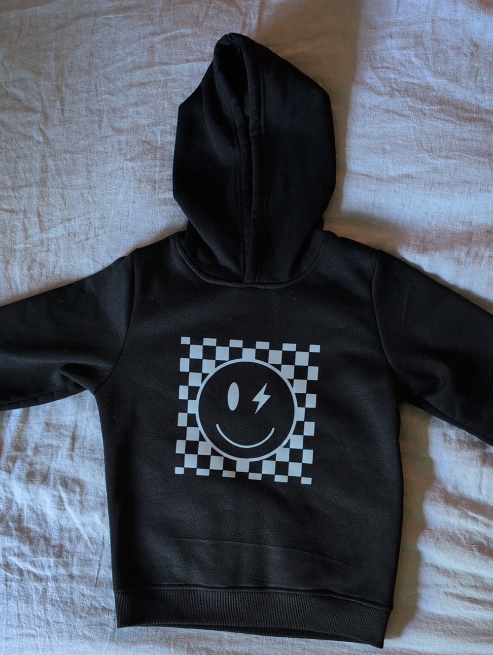 Black Kids Hoodie with Checker Smiley Graphic